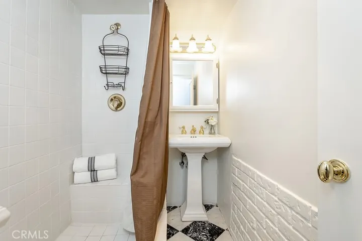 Previously staged. Downstairs bathroom.