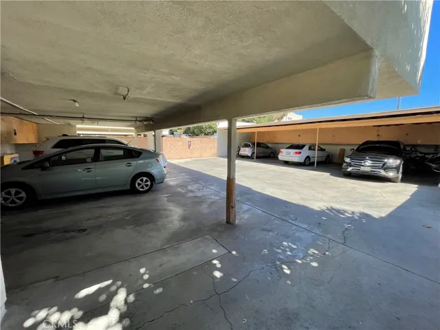 Rear gated carport