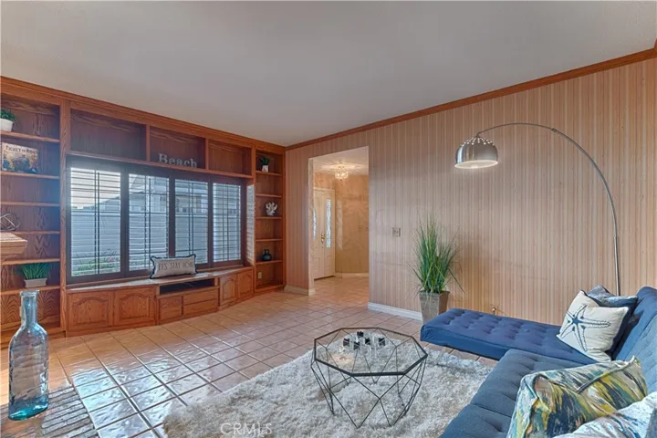 family room with built ins and window seat