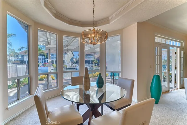 formal dining room with lake view