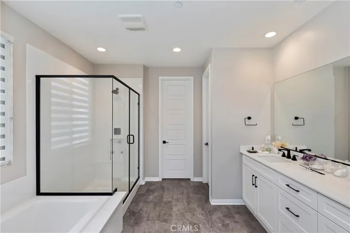 Master bathroom with soaking tub and shower