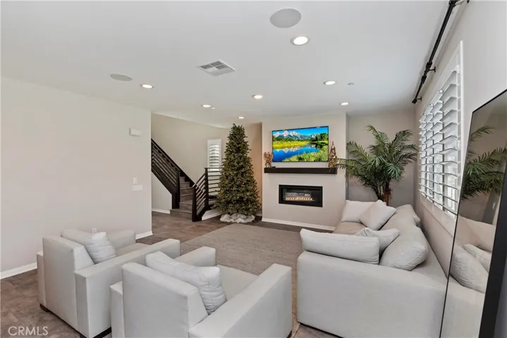 Family room with in-ceiling speakers