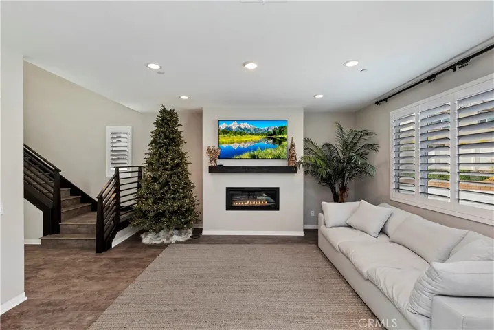LVP flooring throughout downstairs. Upgraded horizontal railings are a striking feature
