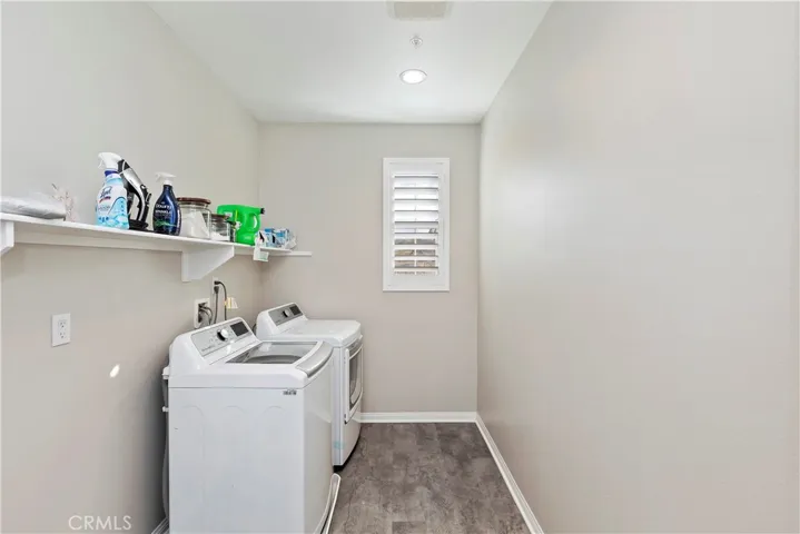 Laundry room has LVP flooring and plumbing installed for future sink