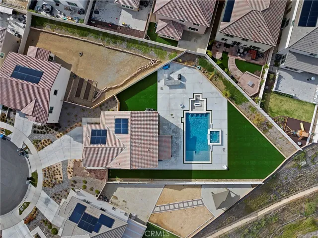 The backyard is completely finished in this almost-brand-new home!