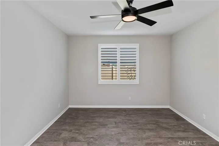 Downstairs office/study area with barn door (not shown in this photo) can easily be made into a bedroom by adding a closet or wardrobe.