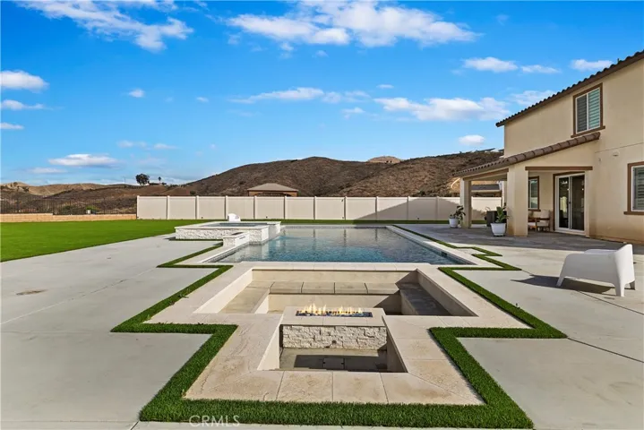 sunken fire pit area has built-in seating