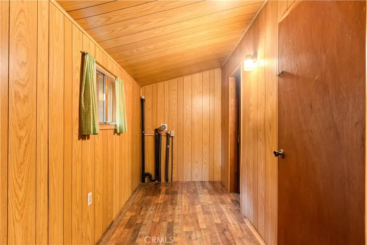 You can use this room for storage or office. The door to the right goes the basement.
