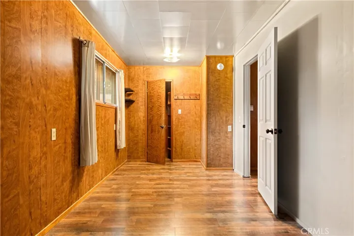 Door to enter from the living room and closet door to  walk-in closet.
