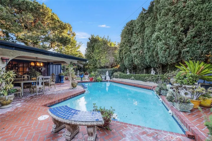 Pool, patio and garden view