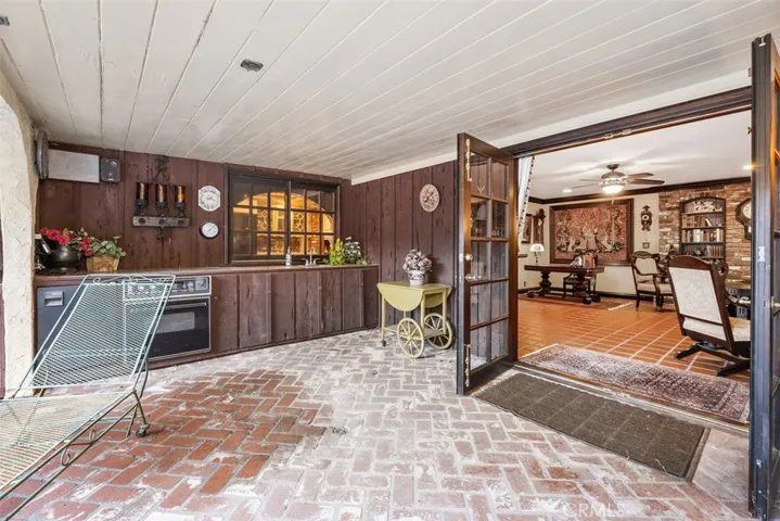 Outdoor grill, oven and fridge off of the family room