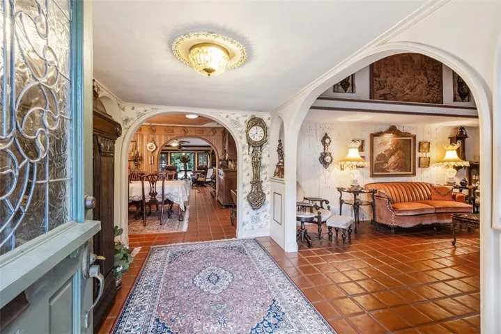 Foyer leading into the living room and dining room.