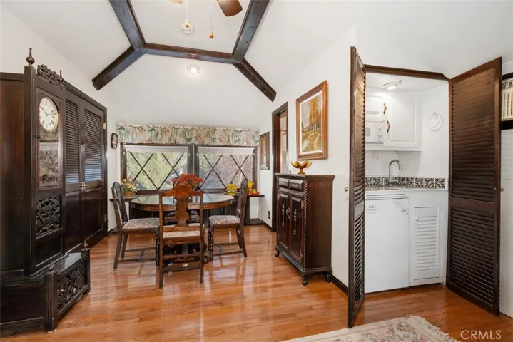 Interior view of guest quarters kitchenette, eating area and closet.