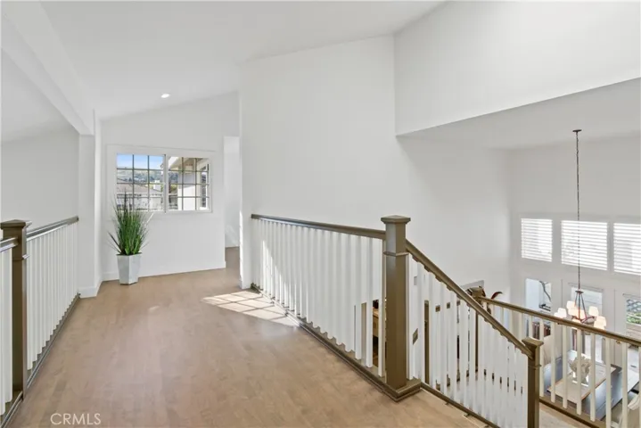 Cat walk dividing Primary bedroom and 3 2ndary bedrooms
