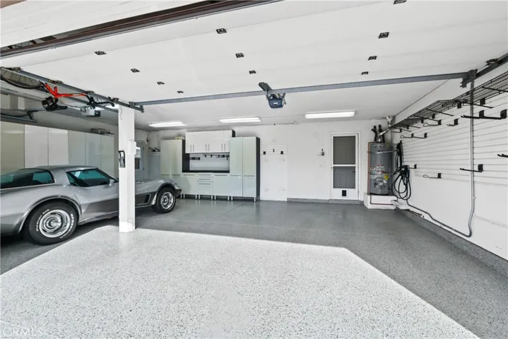 Epoxy floors and built-in cabinetry in garage