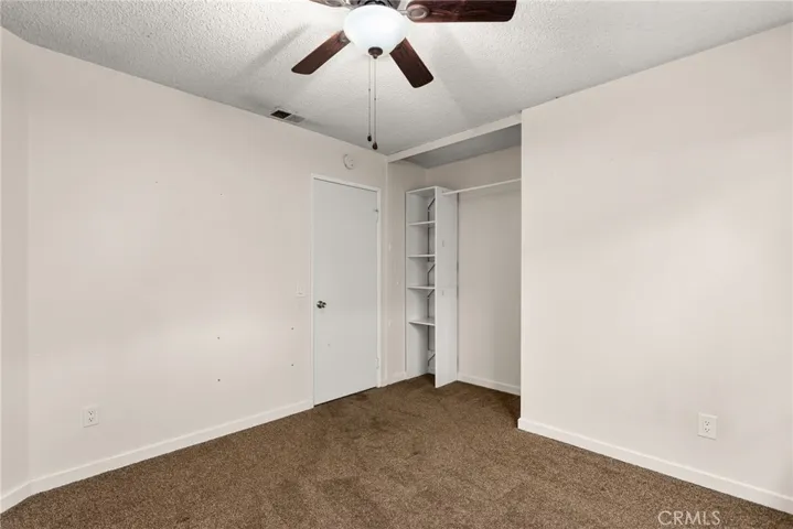 One of two secondary bedrooms