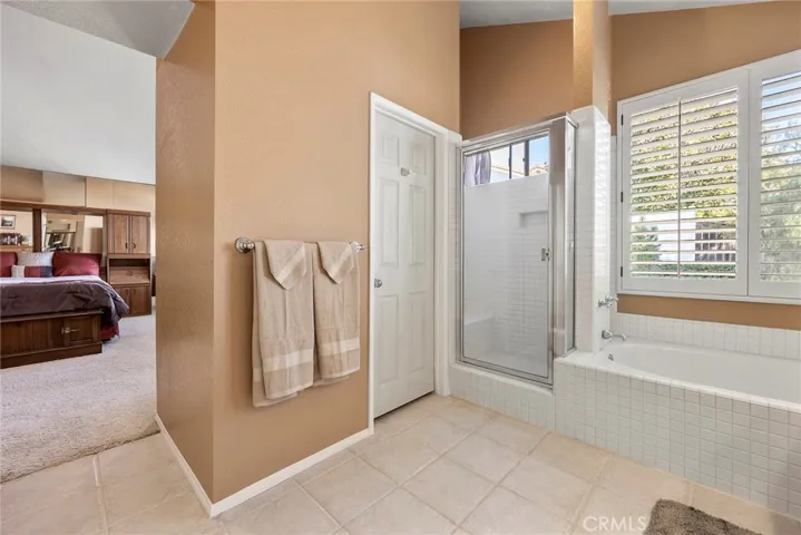 Primary bathroom separate shower and roman bathtub!