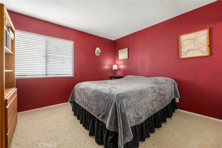 3rd bedroom with mirrored closet
