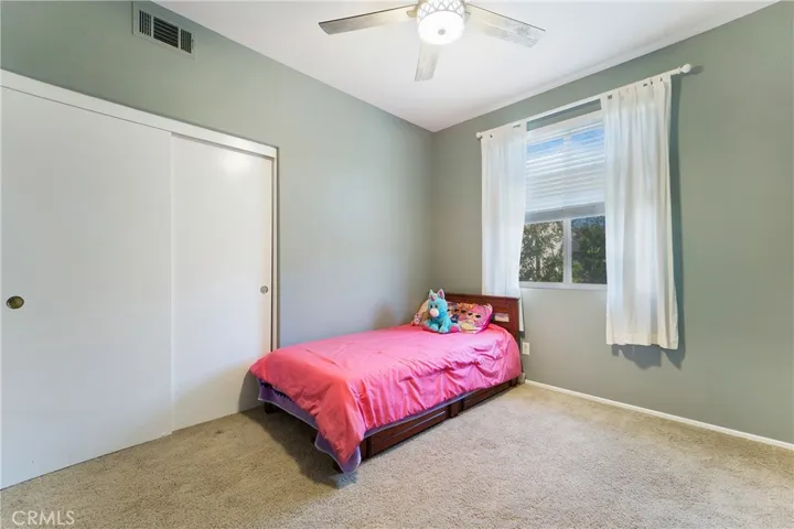 Another darling secondary bedroom.