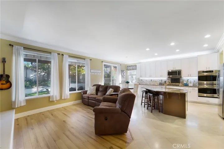 Beautiful wood floors compliment the family room.