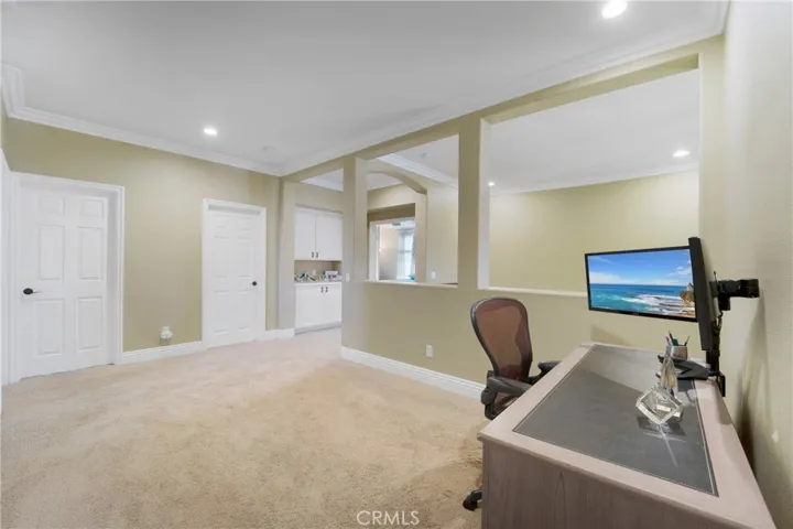 The second floor boasts a loft which many use for study space, a second den or office space.