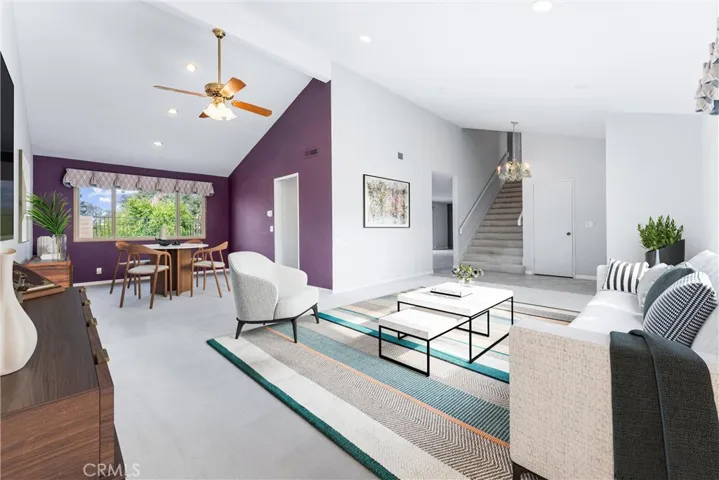 Living room and dining room have been digitally staged.