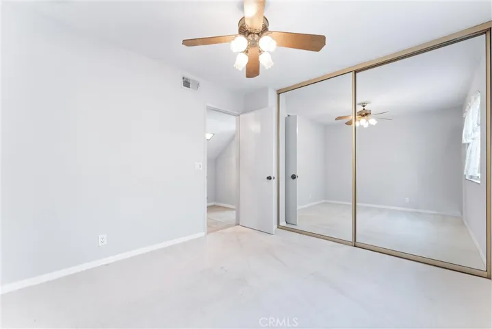 First floor bedroom #1 has mirrored closet doors.