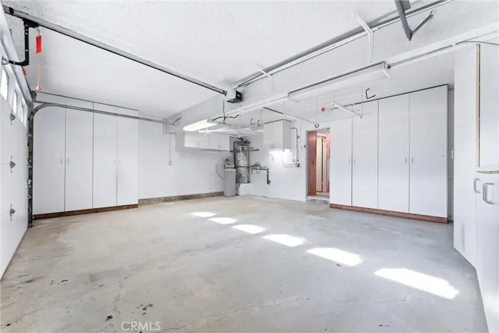 Direct access garage with plenty of storage.