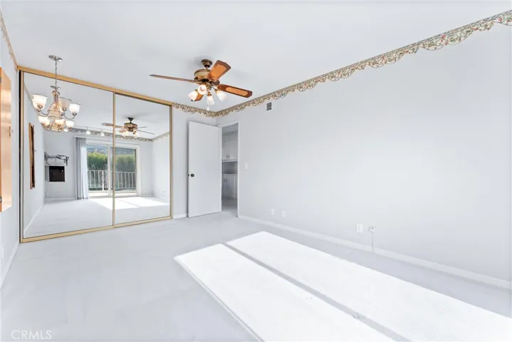 Upstairs bedroom #3 has mirrored closet doors.