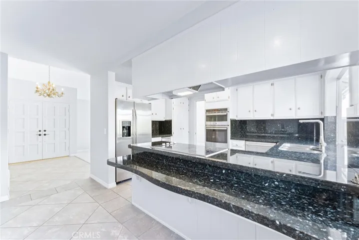 Breakfast bar capable of holding multiple stools.