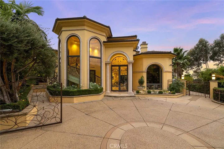 Majestic Entryway, fit for a queen, or king. Driveway is gated for added security.