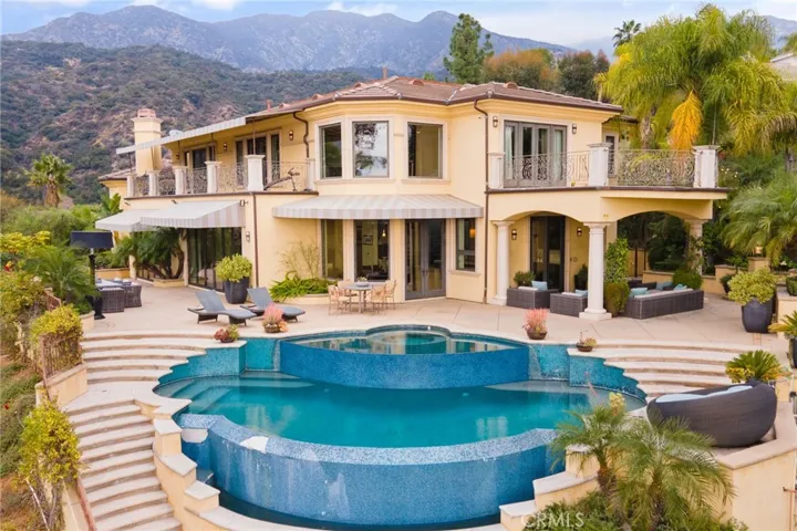 Back of the house. Expansive patio has the perfect amount of indoor outdoor space with views from all around.