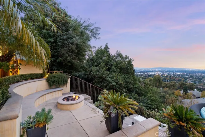 Gas Fire pit and viewing area. Perfect sitting area for your next party, or to watch the fireworks below.