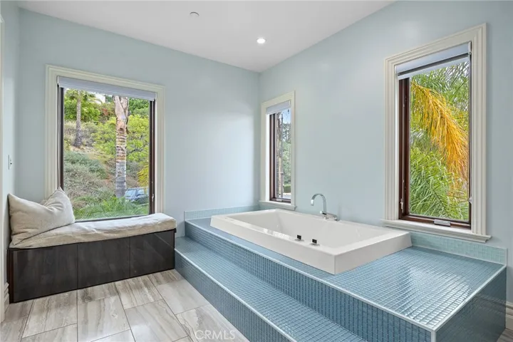 Therapeutic soaking tub in primary bath