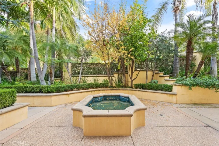 Reflection pond outside of the formal dining room. Many fruit trees on the property including citrus and pomegranate trees.