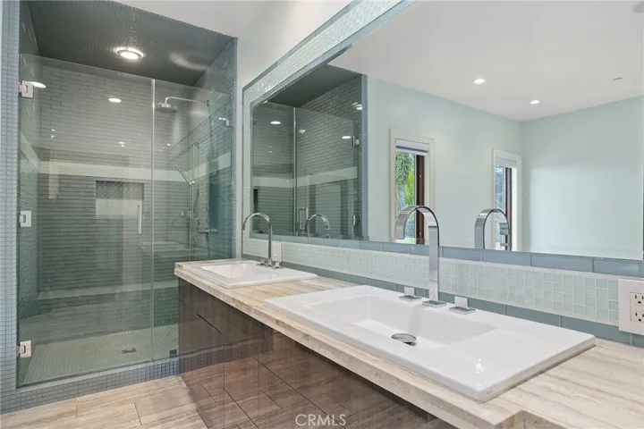 Double Sinks, large shower, separate toilet room with bidet, in primary bath
