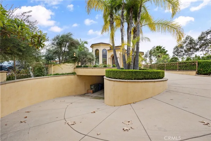 Subterranean garage with covered entry to the 8' garage door into your massive garage.