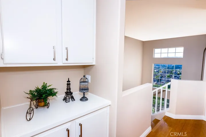 Upstairs Hallway with View and Natural Light