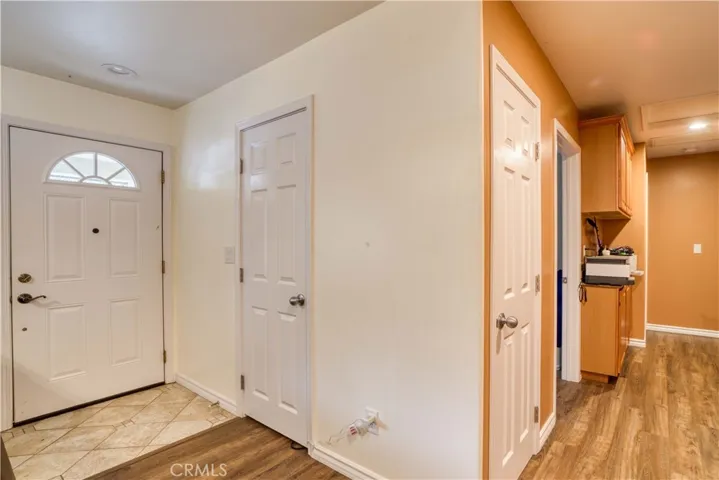 Entry and hallway to 3 beds 1 bath