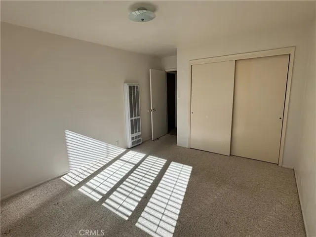 Primary bedroom has regular size closet