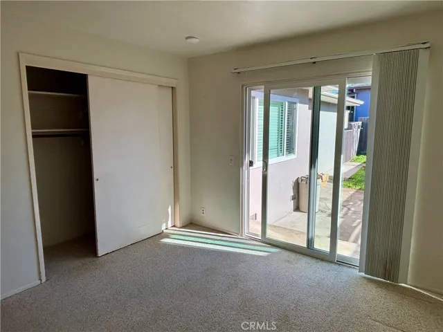 Third bedroom has regular size closet and a slider to the backyard