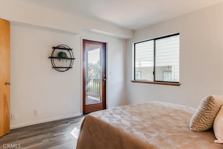 Downstairs bedroom has door to outside downstairs deck.