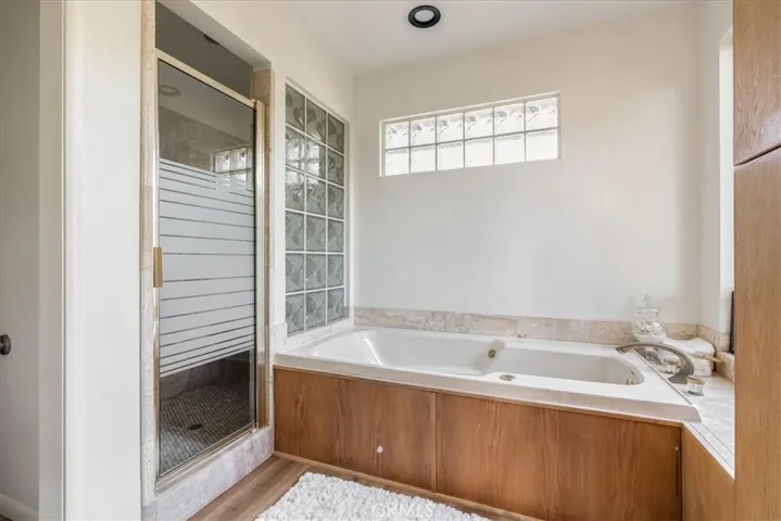 Primary tub and shower.