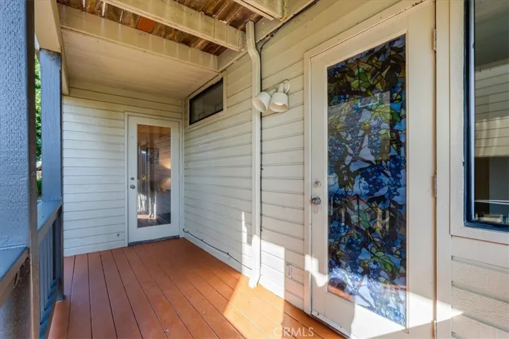 Bottom deck showing doors to each downstairs bedroom.