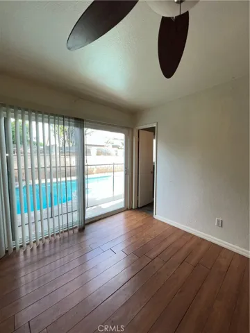 Primary Bedroom with Sliders to Pool Area
