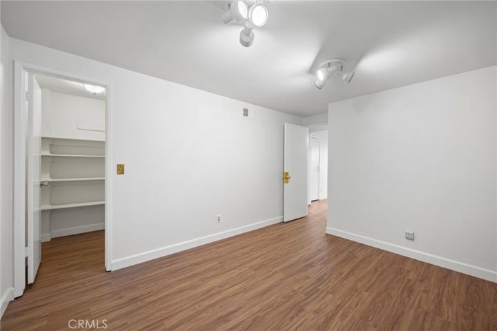 Third Floor bedroom with a walk-in closet