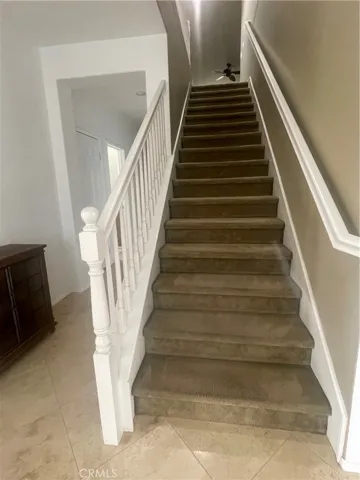 Stairs up to bonous room and bedroom
