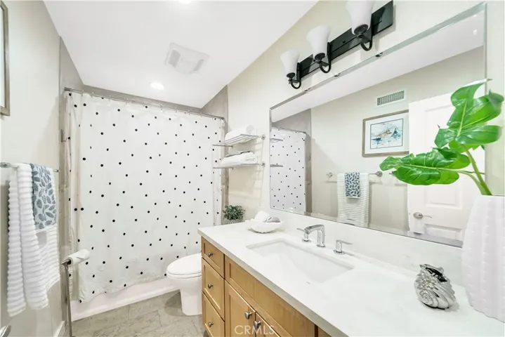 BATHROOMS REMODELED W/QUARTZ & DESIGNER TILE