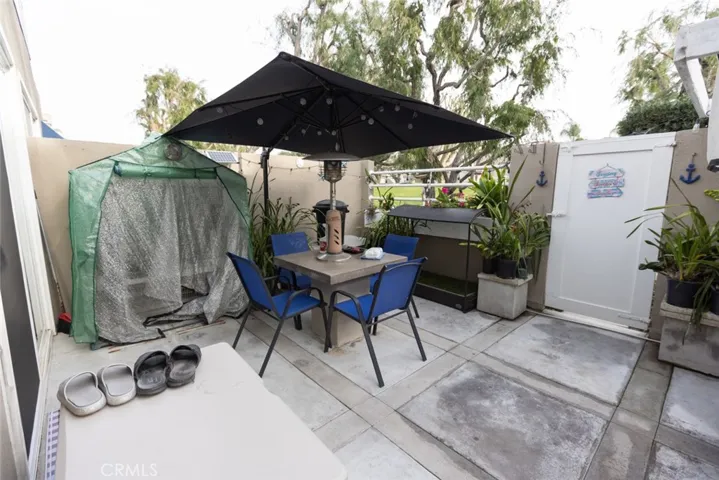 private deck off living room to green belt