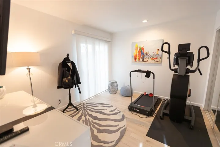 1st Guest bedroom w/ water views and shared balcony with bedroom #2